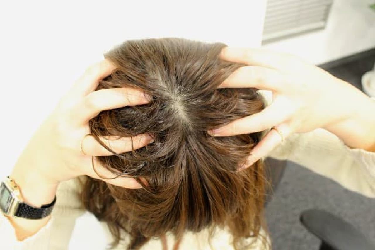 Massage the scalp with the pad of your finger