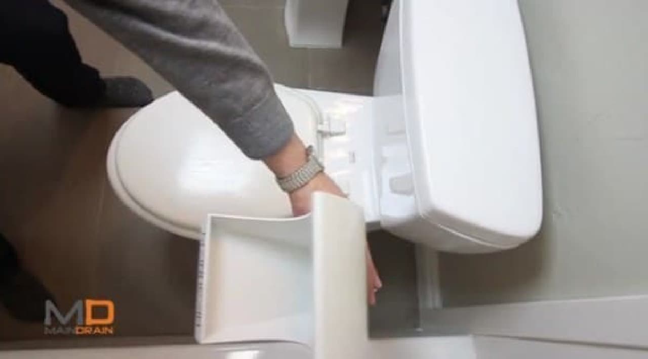 There is no need to open the toilet bowl lid when using
