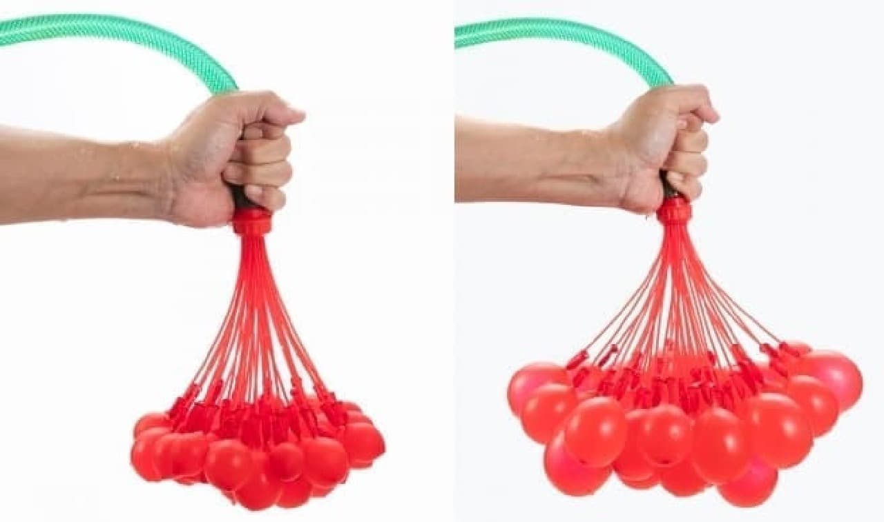 Balloons are connected to the ends of straw-shaped hoses