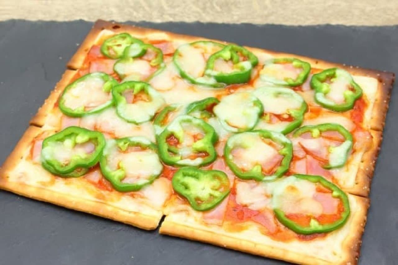 Easy pizza recipe made with crackers--with plenty of cheese and bacon