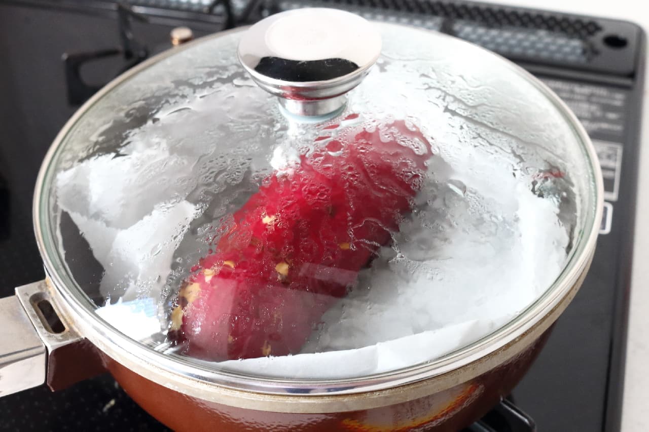 Sweet potatoes steamed in a frying pan