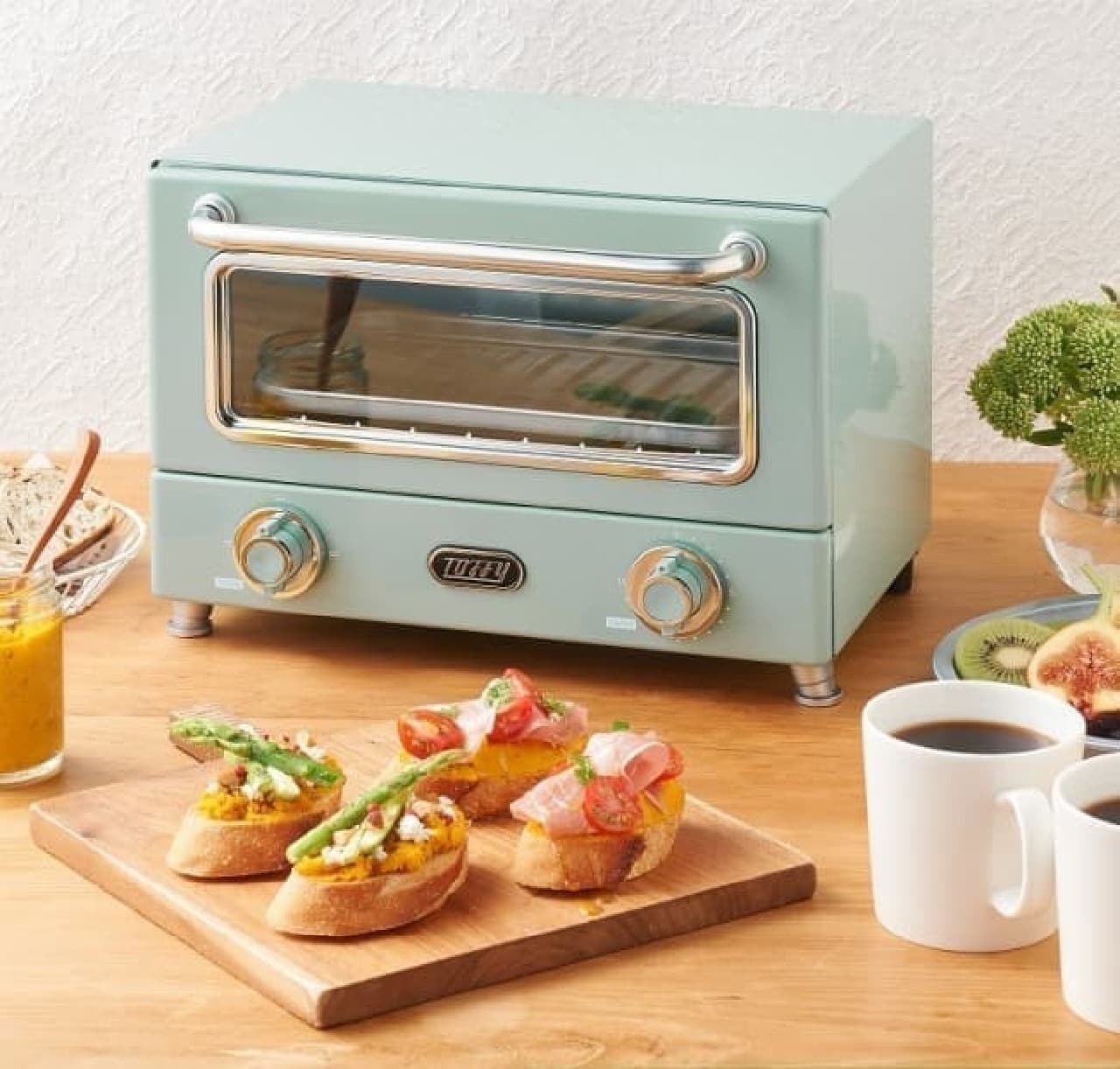Toffy's first horizontal oven toaster--two slices of bread at the same time, brown and fluffy