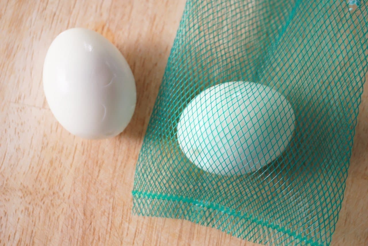 Chopped eggs with a vegetable net