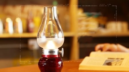 An LED lamp with a retro look like an oil lamp--the light goes out when you breathe
