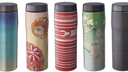 A graceful stainless steel bottle depicting Sakura and Mt. Fuji--a gift in a paulownia box