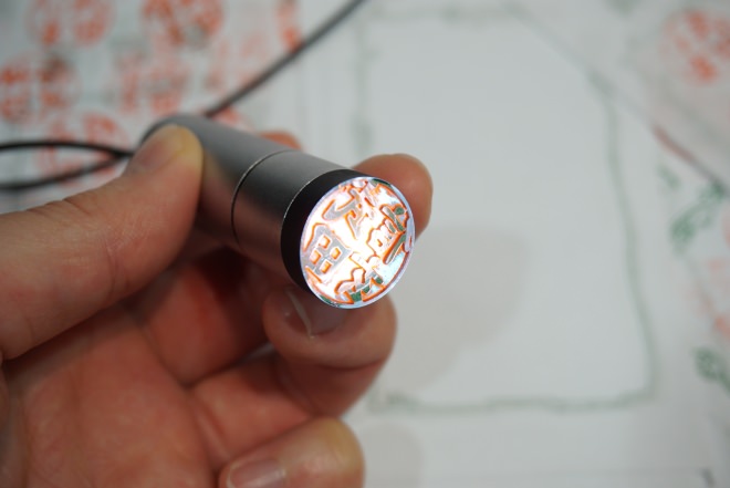 "Projector stamp" where the imprint is projected by LED